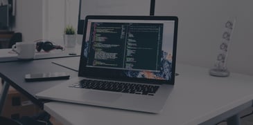 Computer with code in the screen