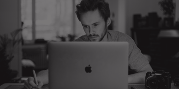 man using mac laptop