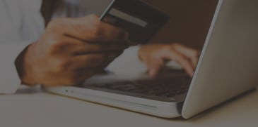 Person making purchase online - ACBM blog replacing an in-house e-commerce JDE integration with Orchestrator