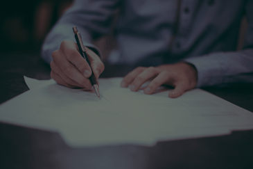 Feature Image : Top Pitfalls to Avoid in Reporting from Your Chart of Accounts - Image : Man making notes on reporting